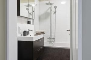 Koupelna v ubytování City-Appartment schick, Einzelgarage inkl