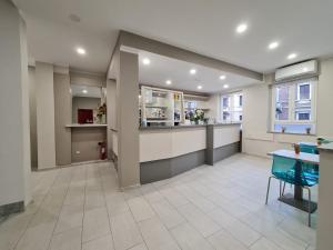 A kitchen or kitchenette at Hotel City 20