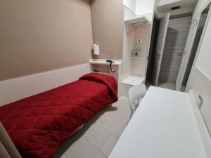 A bed or beds in a room at Hotel City 20