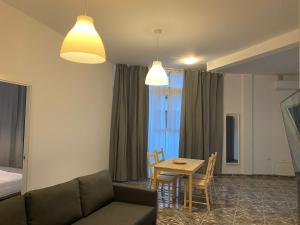 Postel nebo postele na pokoji v ubytování Apartamentos La Aldea Suites