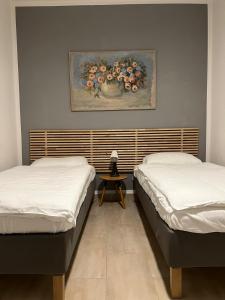 Un pat sau paturi într-o cameră la IL CAPRICCIO DI SILVIA