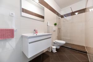 Kúpeľňa v ubytovaní Apartments Villa Visnjik + 30 fotografií