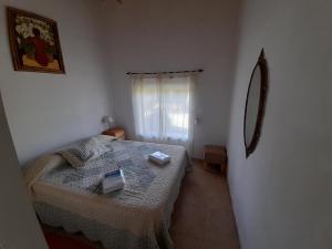 Кровать или кровати в номере Lugar Maravilloso