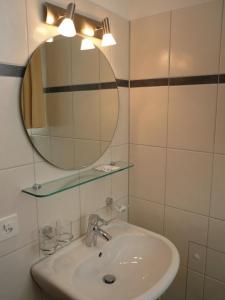 Ein Badezimmer in der Unterkunft Gasthaus Tübli Gersau
