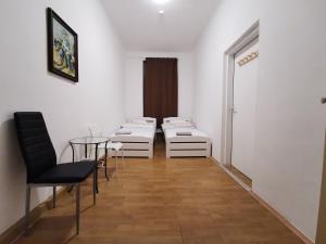 Voodi või voodid majutusasutuse 7brunnen Hostel Beds & Rooms toas
