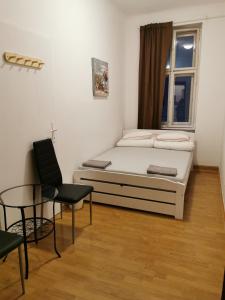 Voodi või voodid majutusasutuse 7brunnen Hostel Beds & Rooms toas