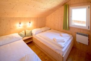 Postel nebo postele na pokoji v ubytování Chalet Steiermark