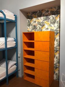 Ένα ή περισσότερα κρεβάτια σε δωμάτιο στο H Hostel Friendly Accommodation