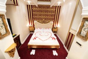 Posteľ alebo postele v izbe v ubytovaní Erossuite GuestHouse