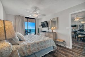 a bedroom with a bed with a view of the ocean at Phoenix East 604 in Orange Beach +63 photos