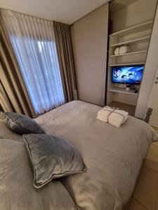 Nueva Córdoba - Premium客房内的一张或多张床位