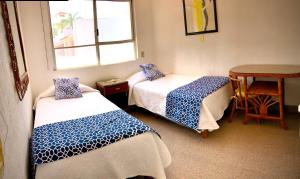 Postel nebo postele na pokoji v ubytování Casa Romantica De Playa + 23 fotografií