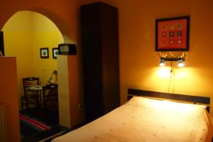 Postel nebo postele na pokoji v ubytování Guest Accommodation Etno Konak Tašana