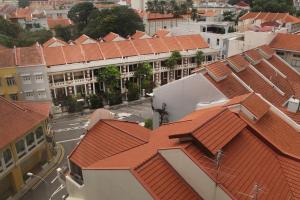 an overhead view of a city with red roofs at Dorsett Singapore - Newly Refurbished in Singapore