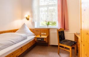Postel nebo postele na pokoji v ubytování Hotel Carola + 25 fotografií