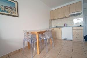 Kuchyňa alebo kuchynka v ubytovaní Apartments Tamarix