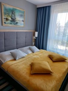 Postel nebo postele na pokoji v ubytování Międzyzdroje - Bel Mare Resort - Apartament Prywatny LeBrosina