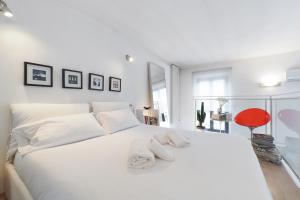 Postel nebo postele na pokoji v ubytování PrimoPiano - XXII Marzo