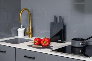 Kuchyňa alebo kuchynka v ubytovaní Mogilska Apartments by Renters Prestige + 36 fotografií