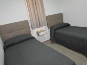 Posteľ alebo postele v izbe v ubytovaní MOJACAR SUN 365