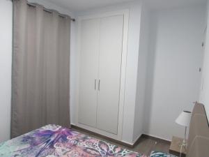 Posteľ alebo postele v izbe v ubytovaní MOJACAR SUN 365