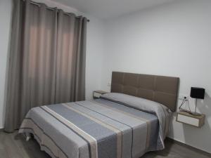 Posteľ alebo postele v izbe v ubytovaní MOJACAR SUN 365