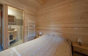 Postel nebo postele na pokoji v ubytování Odalys Chalet D'Alice + 1 fotografie