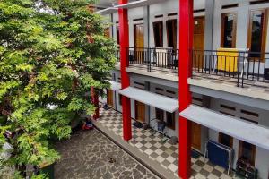 Photo de la galerie de l'établissement Homestay Griya Sawah Gunung Syariah Mitra RedDoorz, à Banjarnegara