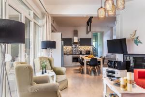 TV a/nebo společenská místnost v ubytování Villa Aelia by Kardous