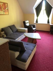 Posedenie v ubytovaní Hotel West