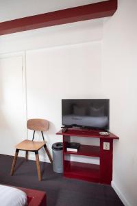TV a/nebo společenská místnost v ubytování Hotel Internationaal