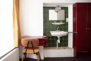Koupelna v ubytování Hotel Internationaal