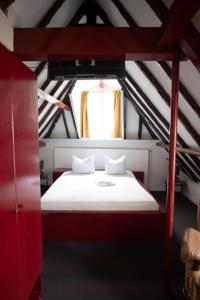 Postel nebo postele na pokoji v ubytování Hotel Internationaal