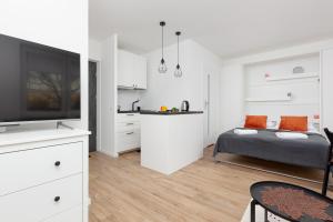 Kuchyň nebo kuchyňský kout v ubytování Studio Apartment Ochota Siemieńskiego by Noclegi Renters