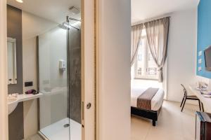 Un baño de Manin Suites LT