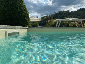 Bazén v ubytování Nidi del faggio rosso - Family Holiday Home nebo v jeho okolí