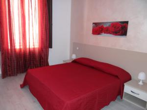 A bed or beds in a room at Le casette del generale