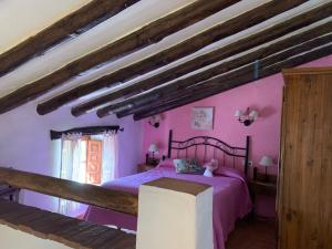 Katil atau katil-katil dalam bilik di Villa Jardin piscina climatizada