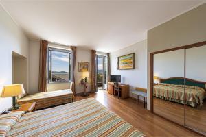 Postel nebo postele na pokoji v ubytování Intra Hotel