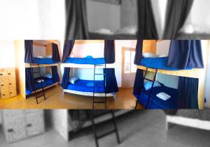 - un ensemble de lits superposés dans une chambre dans l'établissement OliWine hostel, à Maipú