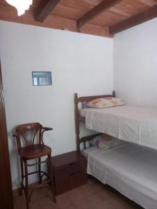 Двухъярусная кровать или двухъярусные кровати в номере Beach Island House