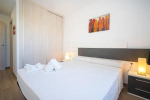 A bed or beds in a room at Rosa Chenz