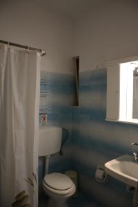 A bathroom at Thalis Rooms