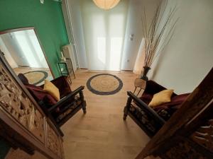 A seating area at Green tea balcony - quiet & cozy- Ano Glyfada
