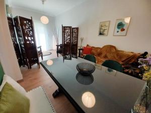 A seating area at Green tea balcony - quiet & cozy- Ano Glyfada