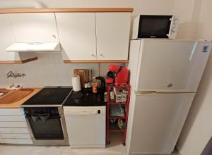 A kitchen or kitchenette at Green tea balcony - quiet & cozy- Ano Glyfada