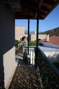 A balcony or terrace at Thalis Rooms