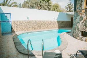 The swimming pool at or close to Villa Cervantes Sonnenland con piscina privada climatizada