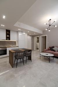 A kitchen or kitchenette at Blu & Marrone Suites-parking included
