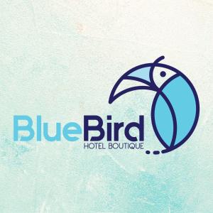 a blue bird hotel logo with a palm tree at Blue Bird in Bacalar